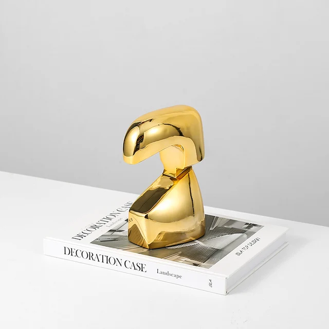 Gold beak ornament