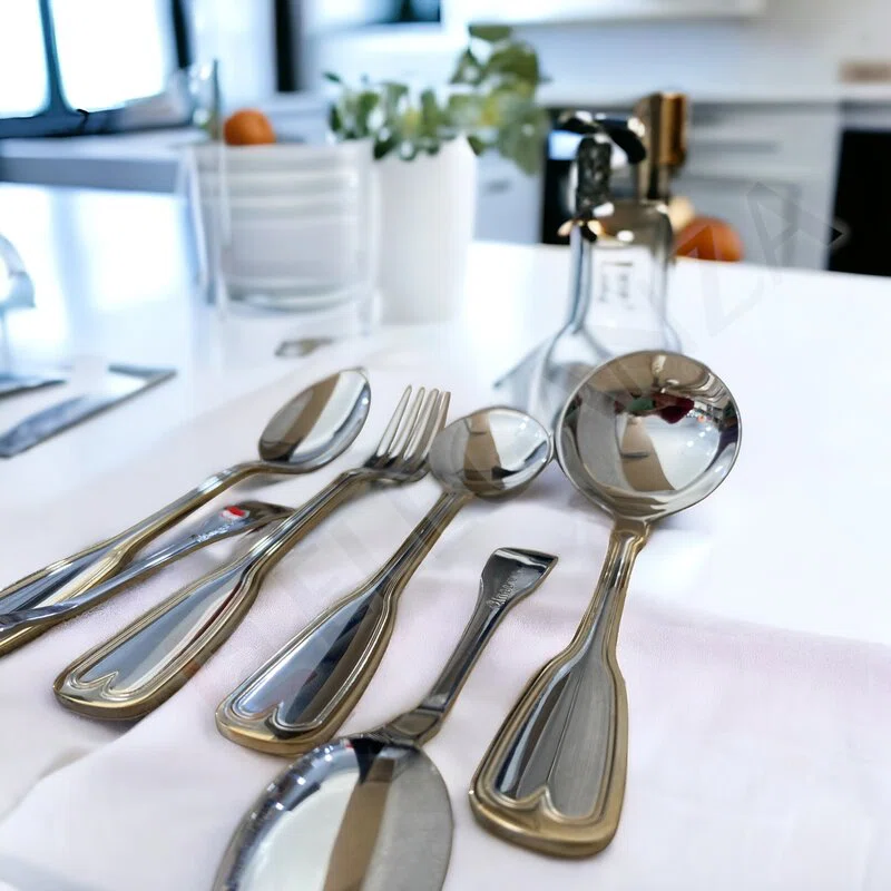Coffret Ménagère LINES 72 pièces en inox et doré 18/10